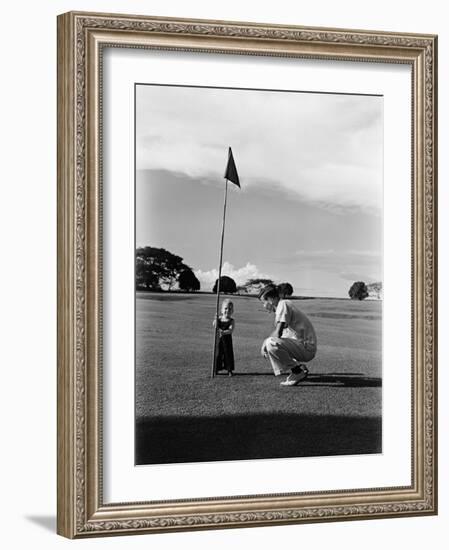 Mr. Ainar Westley and His Son Mike on the Golf Course at the Canlubang Sugarcane Plantation-Carl Mydans-Framed Photographic Print