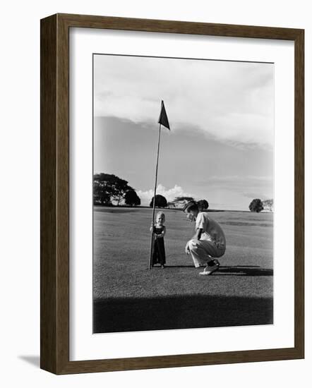 Mr. Ainar Westley and His Son Mike on the Golf Course at the Canlubang Sugarcane Plantation-Carl Mydans-Framed Photographic Print