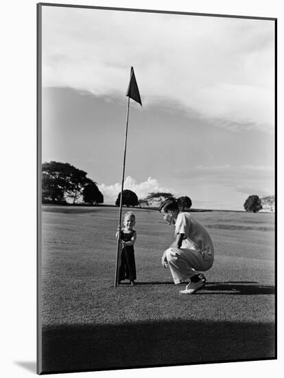 Mr. Ainar Westley and His Son Mike on the Golf Course at the Canlubang Sugarcane Plantation-Carl Mydans-Mounted Photographic Print