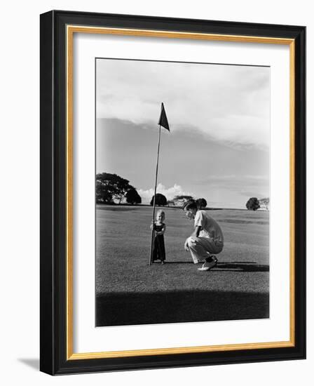 Mr. Ainar Westley and His Son Mike on the Golf Course at the Canlubang Sugarcane Plantation-Carl Mydans-Framed Photographic Print