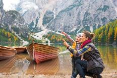 Happy Mother and Baby Pointing on Copy Space While on Lake Braies in South Tyrol, Italy-Mr Alliance-Premier Image Canvas