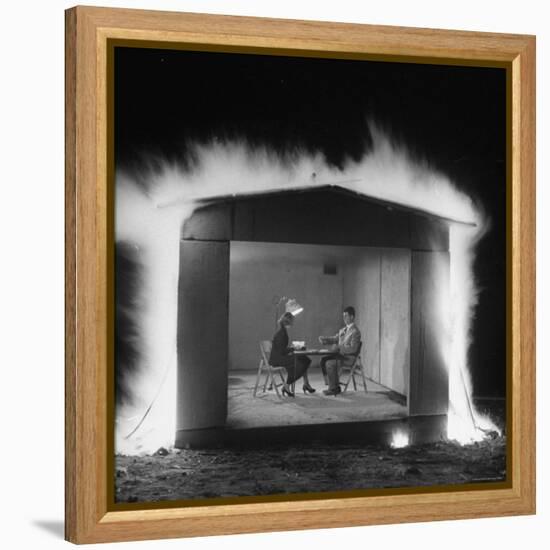 Mr. and Mrs. Andrew Andeck Nonchalantly Playing Double Solitaire While Safelite Garage Flames-Allan Grant-Framed Premier Image Canvas