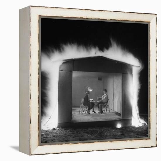 Mr. and Mrs. Andrew Andeck Nonchalantly Playing Double Solitaire While Safelite Garage Flames-Allan Grant-Framed Premier Image Canvas