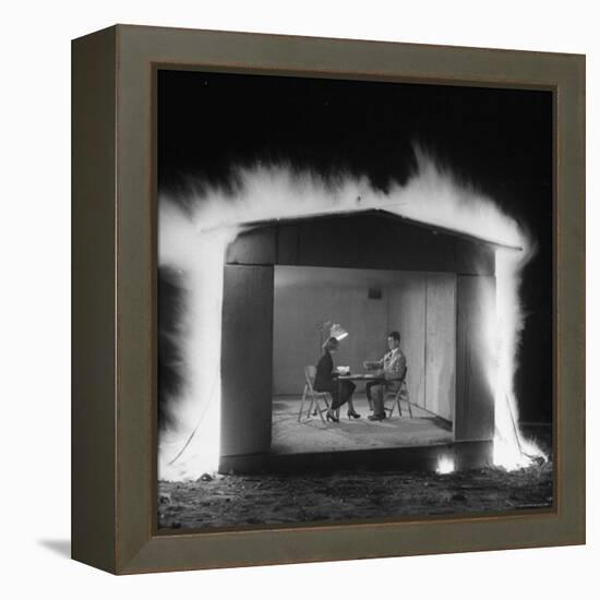 Mr. and Mrs. Andrew Andeck Nonchalantly Playing Double Solitaire While Safelite Garage Flames-Allan Grant-Framed Premier Image Canvas