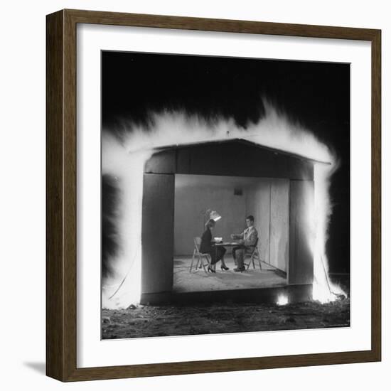 Mr. and Mrs. Andrew Andeck Nonchalantly Playing Double Solitaire While Safelite Garage Flames-Allan Grant-Framed Photographic Print