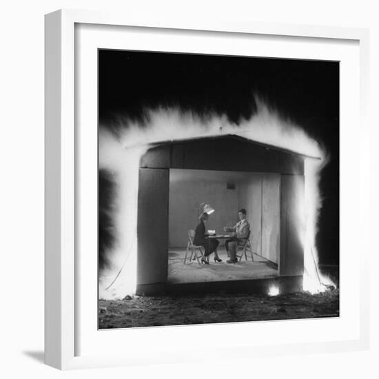 Mr. and Mrs. Andrew Andeck Nonchalantly Playing Double Solitaire While Safelite Garage Flames-Allan Grant-Framed Photographic Print