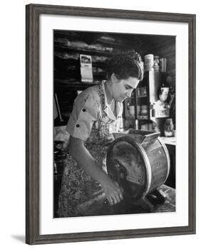 Mrs. Edison Risser Using Hand Operated Butter Making Machine-George Silk-Framed Photographic Print