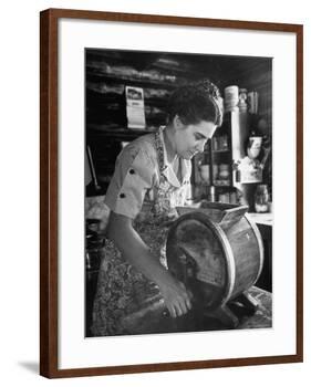 Mrs. Edison Risser Using Hand Operated Butter Making Machine-George Silk-Framed Photographic Print
