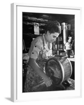 Mrs. Edison Risser Using Hand Operated Butter Making Machine-George Silk-Framed Photographic Print