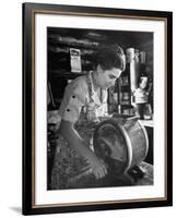 Mrs. Edison Risser Using Hand Operated Butter Making Machine-George Silk-Framed Photographic Print