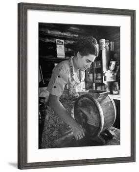 Mrs. Edison Risser Using Hand Operated Butter Making Machine-George Silk-Framed Photographic Print