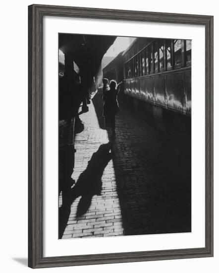 Mrs. Elizabeth Grabowski Carrying Her Son Through Baltimore Penn Station-null-Framed Photographic Print