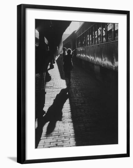 Mrs. Elizabeth Grabowski Carrying Her Son Through Baltimore Penn Station-null-Framed Photographic Print