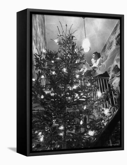 Mrs. George Sutton and Her Family Decorating Their Christmas Tree at Home-Ralph Crane-Framed Premier Image Canvas