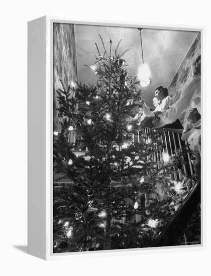 Mrs. George Sutton and Her Family Decorating Their Christmas Tree at Home-Ralph Crane-Framed Premier Image Canvas