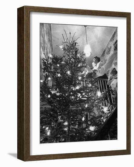 Mrs. George Sutton and Her Family Decorating Their Christmas Tree at Home-Ralph Crane-Framed Photographic Print