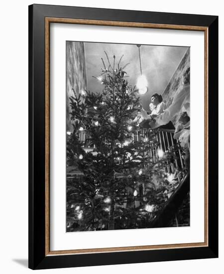 Mrs. George Sutton and Her Family Decorating Their Christmas Tree at Home-Ralph Crane-Framed Photographic Print