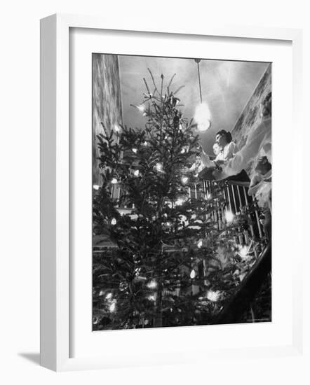 Mrs. George Sutton and Her Family Decorating Their Christmas Tree at Home-Ralph Crane-Framed Photographic Print