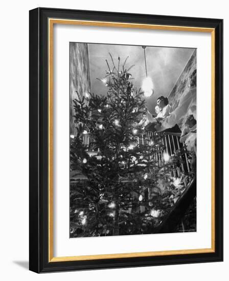 Mrs. George Sutton and Her Family Decorating Their Christmas Tree at Home-Ralph Crane-Framed Photographic Print