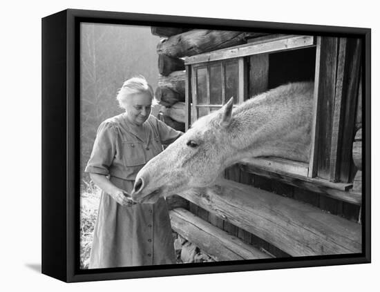 Mrs. Mary Breckenridge Runs the Frontier Nursing Service, Petting Her Horse-Eliot Elisofon-Framed Premier Image Canvas