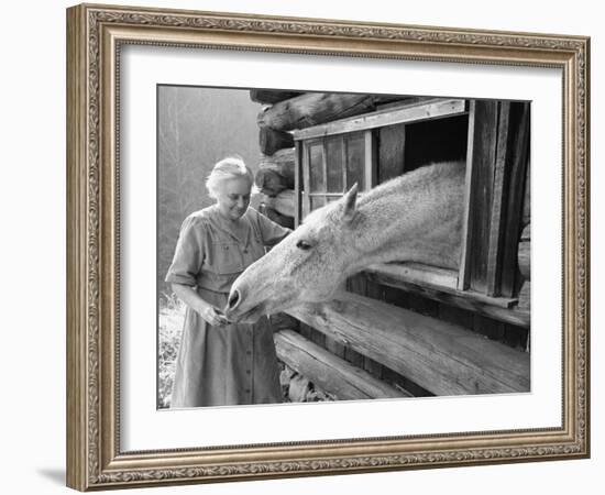 Mrs. Mary Breckenridge Runs the Frontier Nursing Service, Petting Her Horse-Eliot Elisofon-Framed Photographic Print