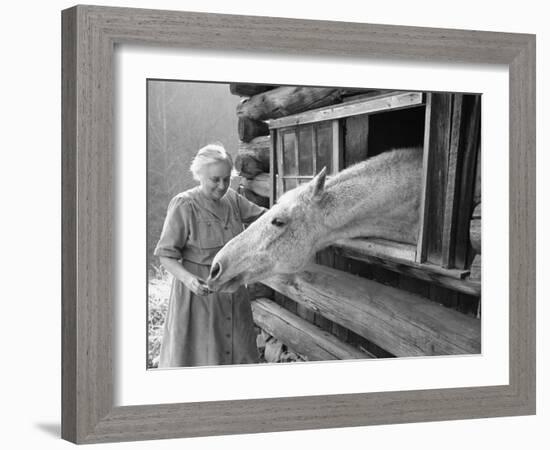 Mrs. Mary Breckenridge Runs the Frontier Nursing Service, Petting Her Horse-Eliot Elisofon-Framed Photographic Print