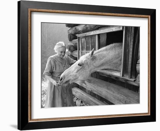 Mrs. Mary Breckenridge Runs the Frontier Nursing Service, Petting Her Horse-Eliot Elisofon-Framed Photographic Print