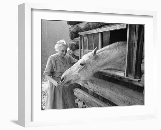 Mrs. Mary Breckenridge Runs the Frontier Nursing Service, Petting Her Horse-Eliot Elisofon-Framed Photographic Print