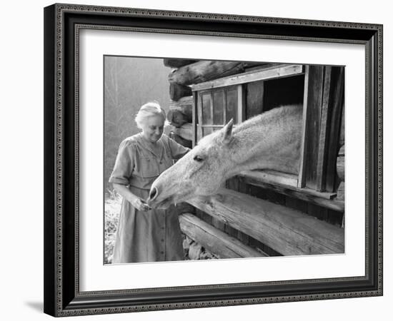 Mrs. Mary Breckenridge Runs the Frontier Nursing Service, Petting Her Horse-Eliot Elisofon-Framed Photographic Print