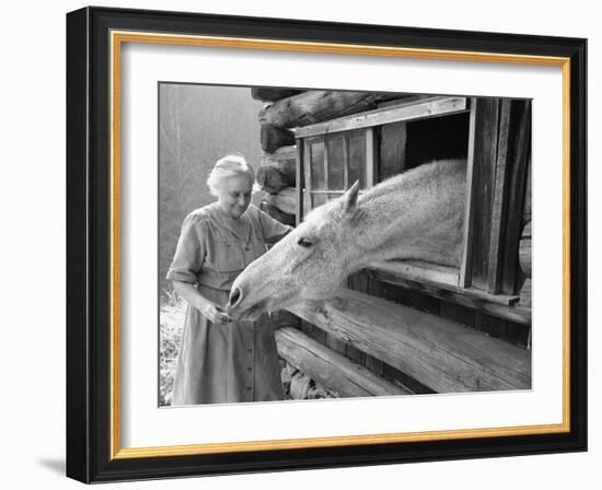 Mrs. Mary Breckenridge Runs the Frontier Nursing Service, Petting Her Horse-Eliot Elisofon-Framed Photographic Print