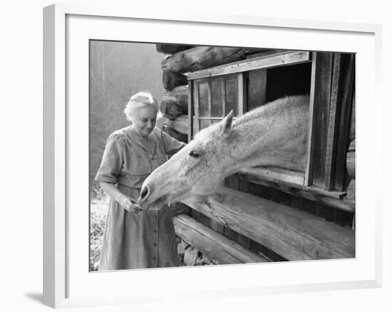 Mrs. Mary Breckenridge Runs the Frontier Nursing Service, Petting Her Horse-Eliot Elisofon-Framed Photographic Print