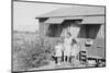 Mrs. Naguchi, with Louise Tami Nakamura and Joyce Yuki Nakamura at Manzanar, 1943-Ansel Adams-Mounted Photographic Print