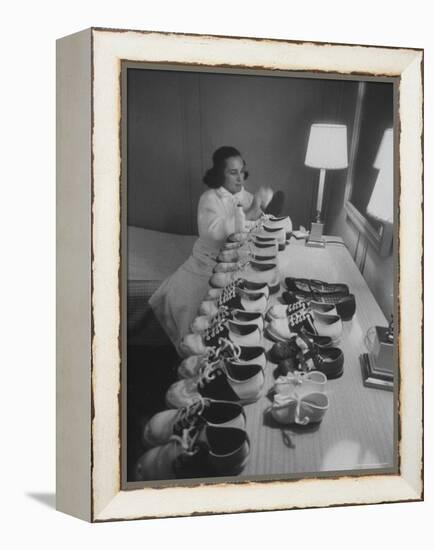 Mrs. Ottilie King Lining Up Her Children's Shoes-Stan Wayman-Framed Premier Image Canvas