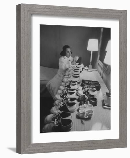 Mrs. Ottilie King Lining Up Her Children's Shoes-Stan Wayman-Framed Photographic Print