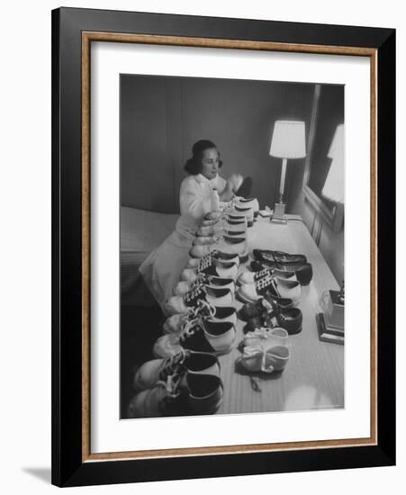 Mrs. Ottilie King Lining Up Her Children's Shoes-Stan Wayman-Framed Photographic Print