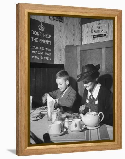 Mrs. Robert Neve and Son Peter Eating Supper in Restaurant-Hans Wild-Framed Premier Image Canvas