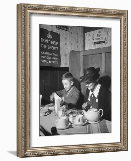 Mrs. Robert Neve and Son Peter Eating Supper in Restaurant-Hans Wild-Framed Photographic Print