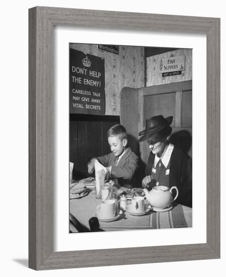 Mrs. Robert Neve and Son Peter Eating Supper in Restaurant-Hans Wild-Framed Photographic Print