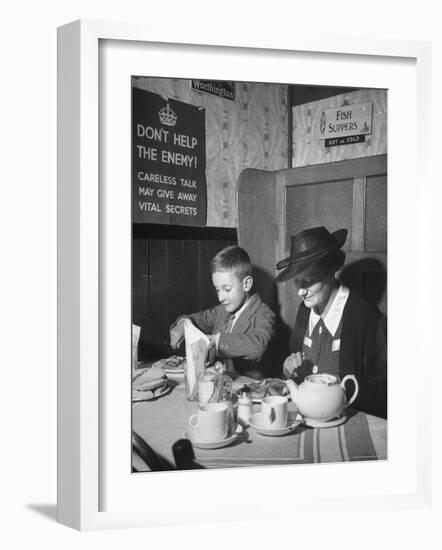 Mrs. Robert Neve and Son Peter Eating Supper in Restaurant-Hans Wild-Framed Photographic Print