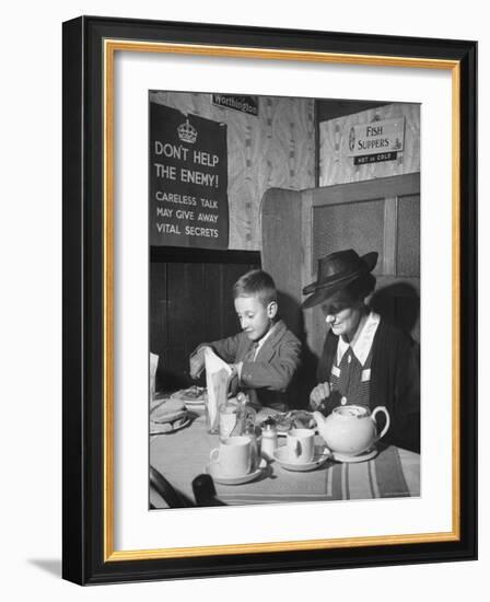 Mrs. Robert Neve and Son Peter Eating Supper in Restaurant-Hans Wild-Framed Photographic Print