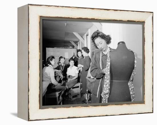 Mrs. Ryie Yoshizawa teaching a dressmaking class to women students at Manzanar, 1943-Ansel Adams-Framed Premier Image Canvas