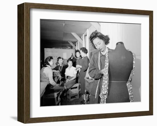 Mrs. Ryie Yoshizawa teaching a dressmaking class to women students at Manzanar, 1943-Ansel Adams-Framed Photographic Print