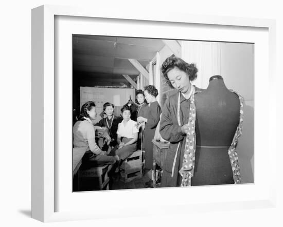 Mrs. Ryie Yoshizawa teaching a dressmaking class to women students at Manzanar, 1943-Ansel Adams-Framed Photographic Print