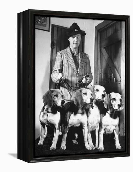 Mrs. William Dupont Jr. Holding Reins of Four Beagles That Belonged to Her Late Husband-Hansel Mieth-Framed Premier Image Canvas