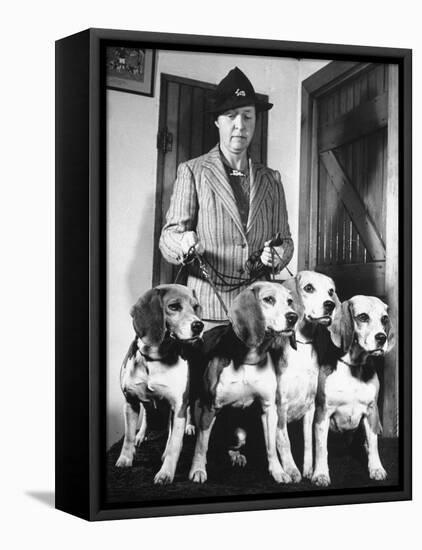 Mrs. William Dupont Jr. Holding Reins of Four Beagles That Belonged to Her Late Husband-Hansel Mieth-Framed Premier Image Canvas