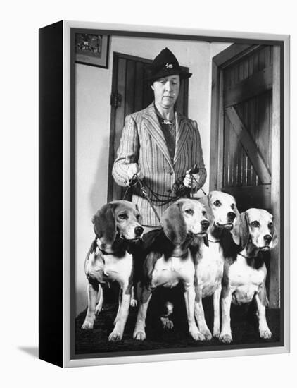 Mrs. William Dupont Jr. Holding Reins of Four Beagles That Belonged to Her Late Husband-Hansel Mieth-Framed Premier Image Canvas