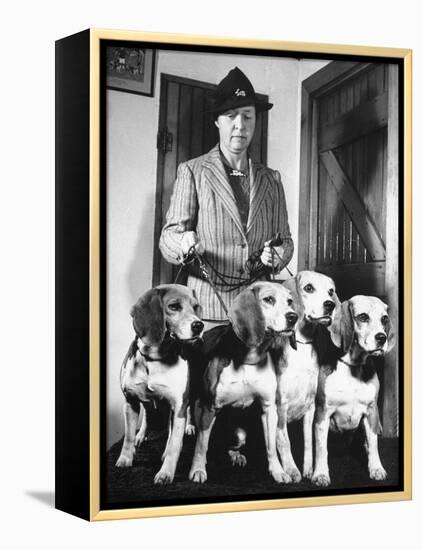 Mrs. William Dupont Jr. Holding Reins of Four Beagles That Belonged to Her Late Husband-Hansel Mieth-Framed Premier Image Canvas