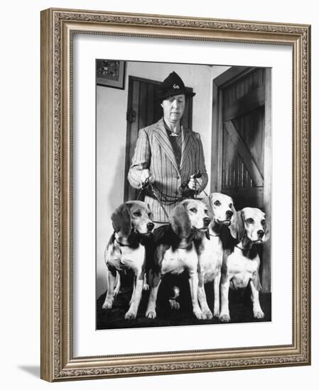 Mrs. William Dupont Jr. Holding Reins of Four Beagles That Belonged to Her Late Husband-Hansel Mieth-Framed Photographic Print