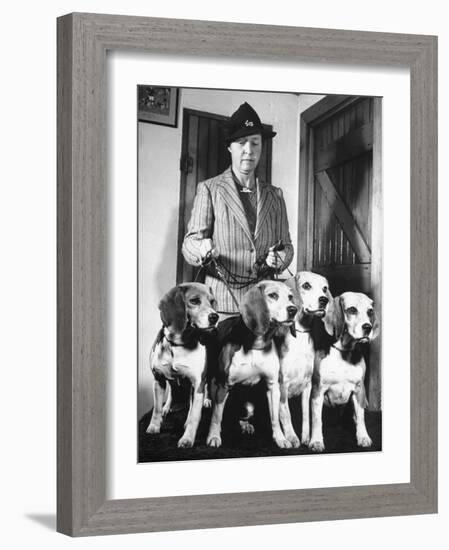 Mrs. William Dupont Jr. Holding Reins of Four Beagles That Belonged to Her Late Husband-Hansel Mieth-Framed Photographic Print