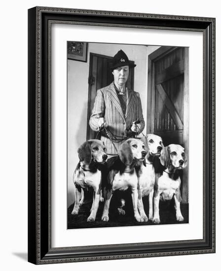 Mrs. William Dupont Jr. Holding Reins of Four Beagles That Belonged to Her Late Husband-Hansel Mieth-Framed Photographic Print